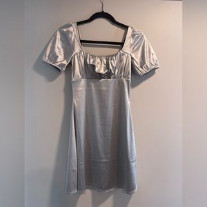 Super cute silver dress.